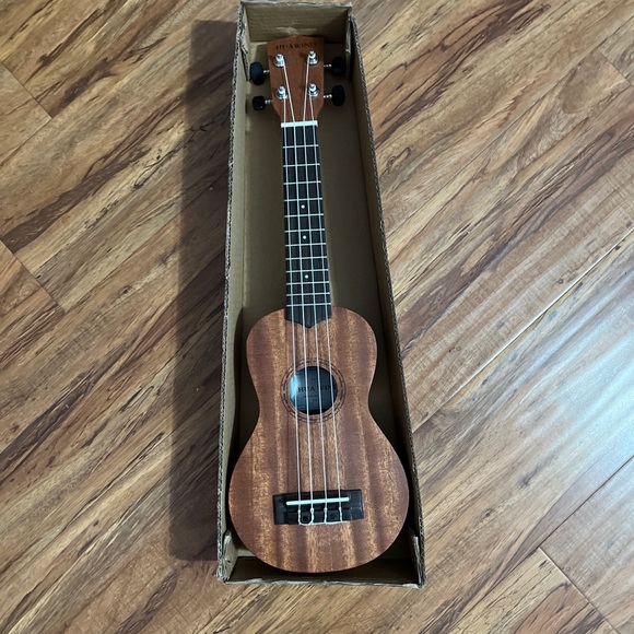 It’s a brand new ukulele for kids. Brand new. $30 But I would rather do a trade - Picture 4 of 6
